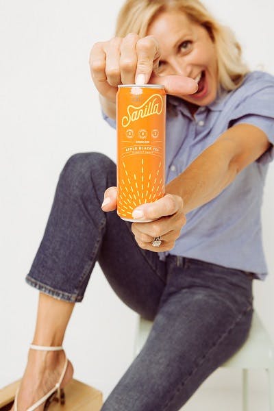 Sara Delaney showing off a Sarilla a non-alcoholic drink